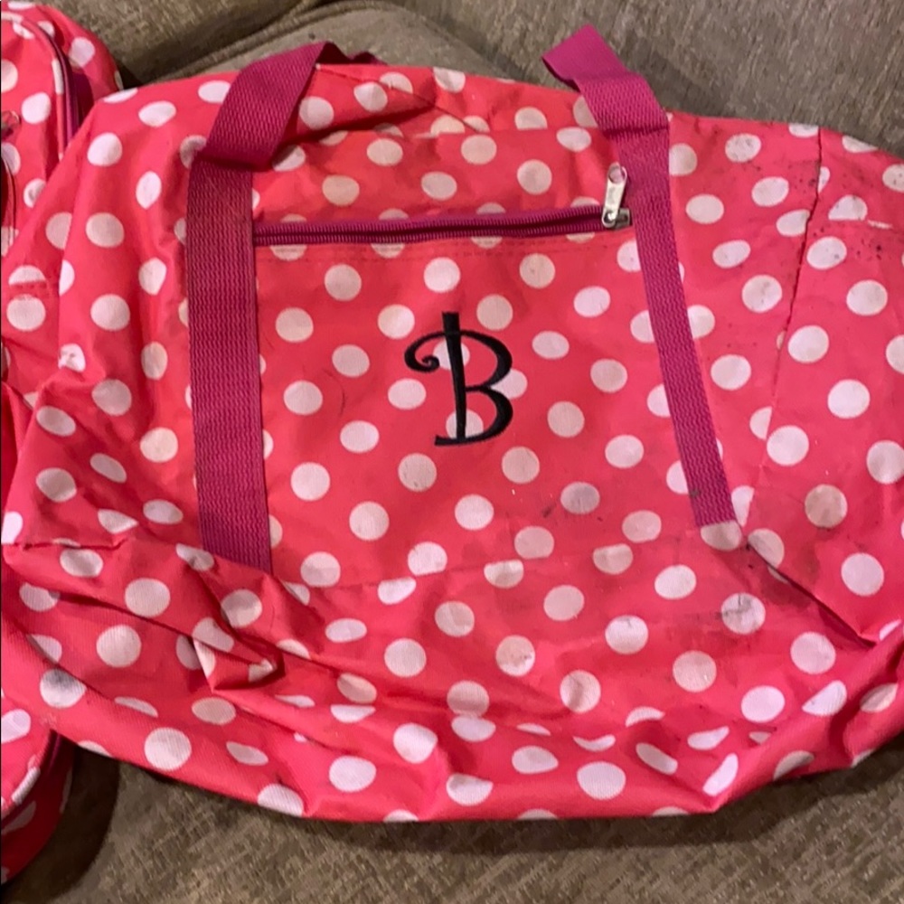 B Suitcase and duffel bag bundle